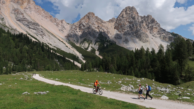Hikers along the Alta Via 1 in Northern Italy