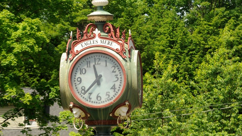 Top of a town clock with Eagles Mere written over the clockface.
