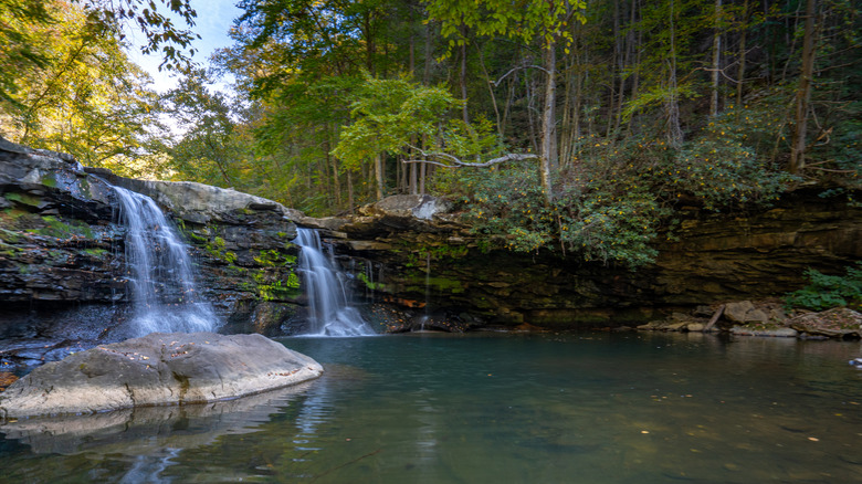 Mill Creek Falls in Hawks Nest State Park during the fall season in the Appalachian Mountains of West Virginia, USA.