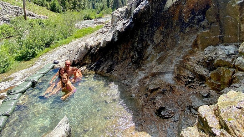 A family enjoys Skillern Hot Springs