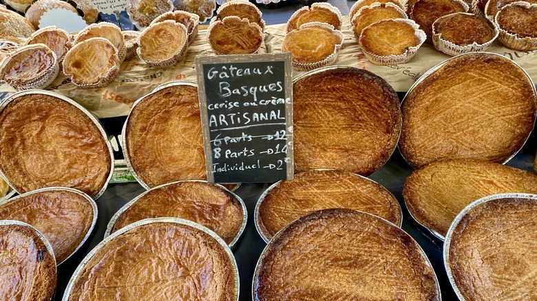 French pastries called gateaux basques lined up in a stall