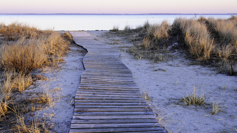 A boardwalk leads to the water in Buzzards Bay, Massachusetts