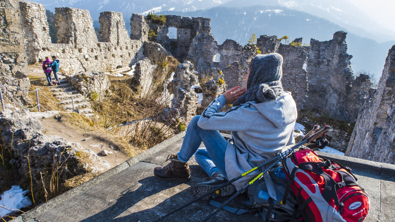 Tourists explore the crumbling interior of Ehrenberg Castle
