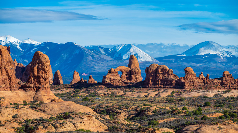 Turret Arch, one of the most recognizable formations in Arches National Park in Moab, Utah, with a breathtaking backdrop of the snow-capped La Sal Mountains