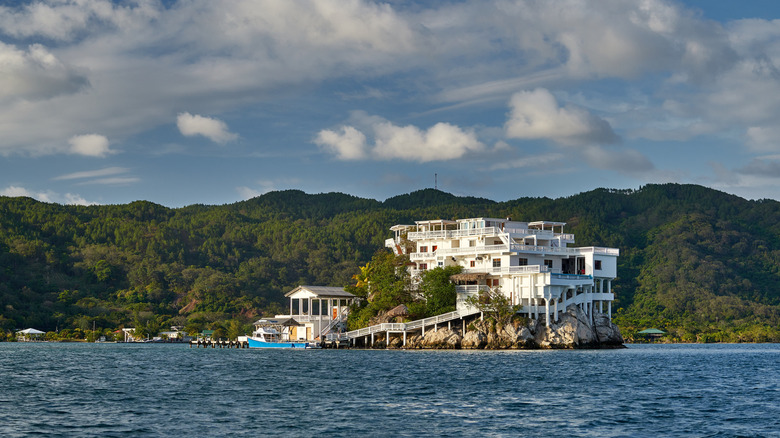 Villa on Dunbar Rock in water surrounding island of Guanaja