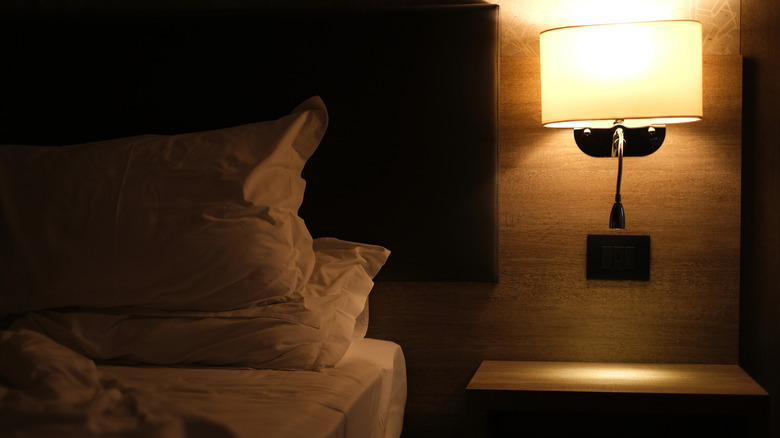 Bedside lamp in hotel room