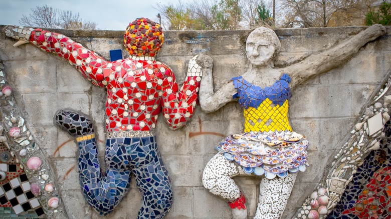 A mosaic sculpture shows two dancers in Smither Park, Houston