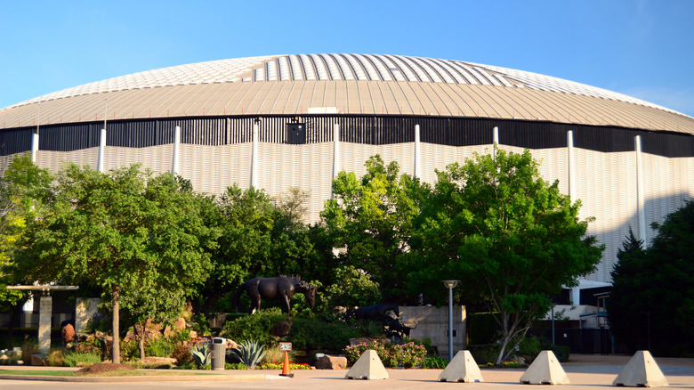 The exterior of the Astrodome with hedge