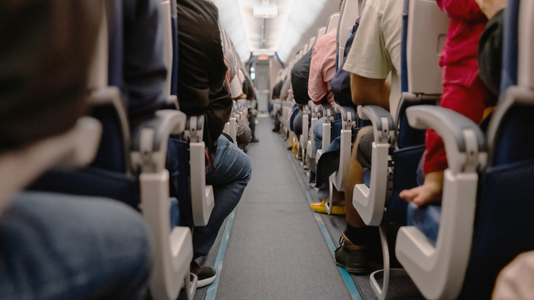 Seats on an airplane from behind