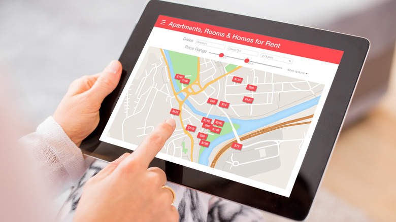 person booking apartment on app