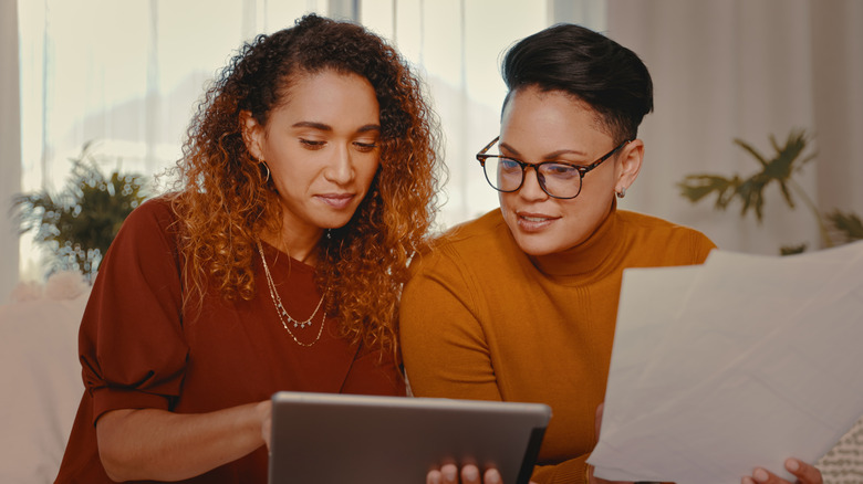 A couple reviewing their contract