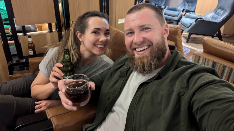 writer in airport lounge in shirt mentioned