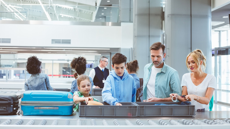 family at security check