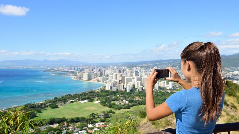 woman taking photo at Diamond Head