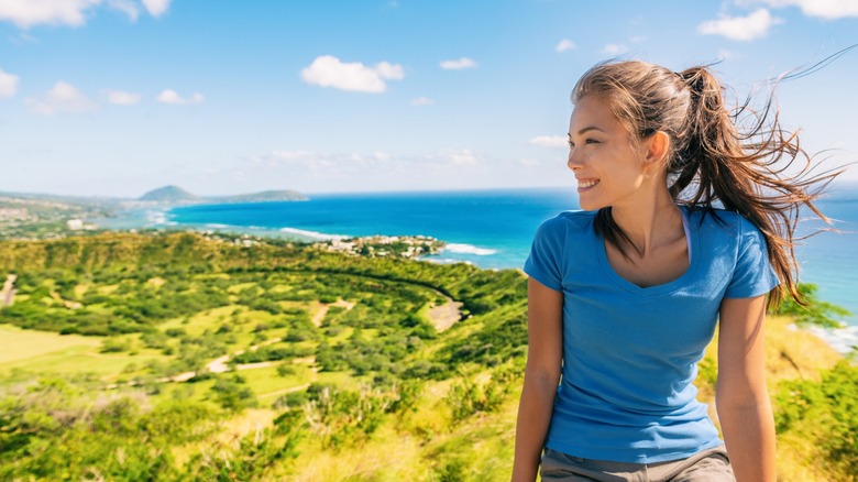 woman at top of Diamond Head