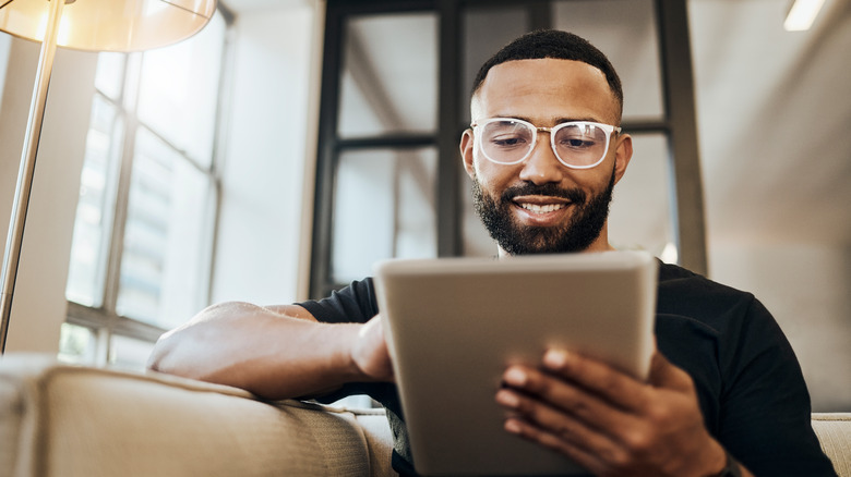 Man on tablet 