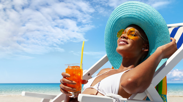 A woman enjoying a beach vacation