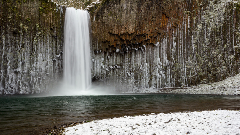 Abiqua Falls cascades in winter surrounded by icy columns
