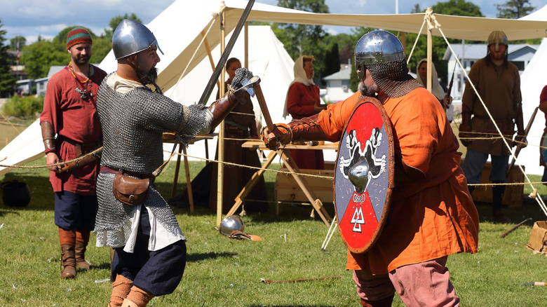 Men sparring at the Viking Festival held in Gimli