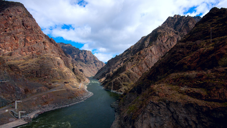 Snake River flows through rock towering over Hells Canyon, Idaho
