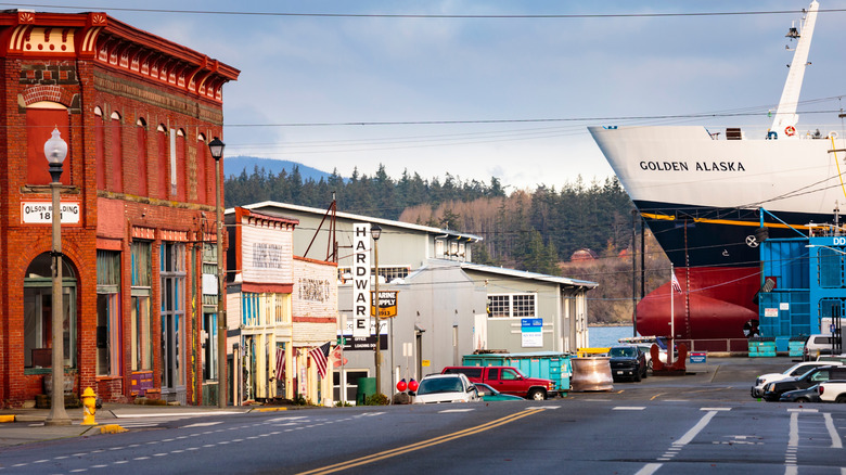Downtown Anacortes, Washington, with the prow of a huge ship in the harbor