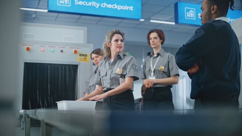 Two female TSA agents at work