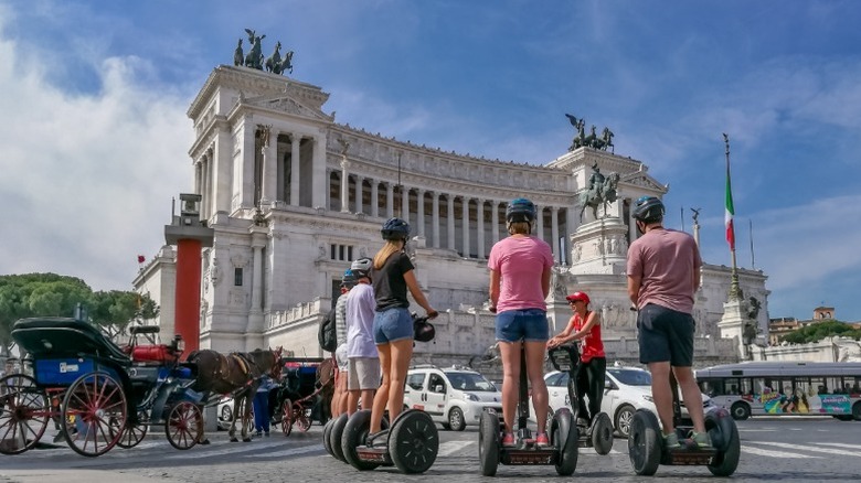 A Segway tour stops in Piazza del Popolo in Rome.