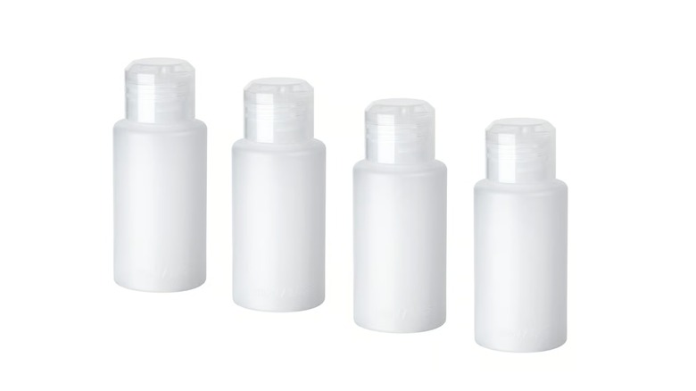 Ikea travel-sized plastic bottles with white background