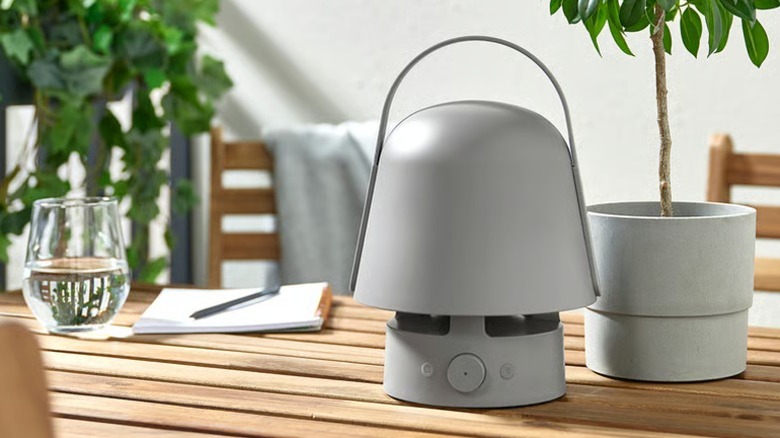 Vappeby Bluetooth speaker lamp from Ikea sitting on picnic table