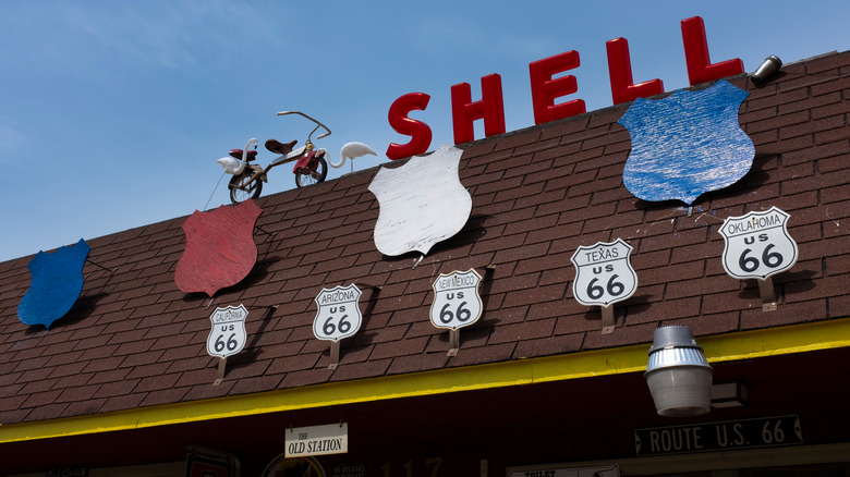 Old Route 66 road signs at an old gas station in Williamsville, Illinois