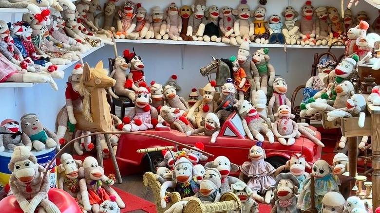 Dozens of sock monkeys crowd a room at the Sock Monkey Museum in Long Grove, Illinois