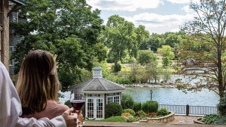 Couple looking at the Fox River from a room at the Herrington Inn & Spa