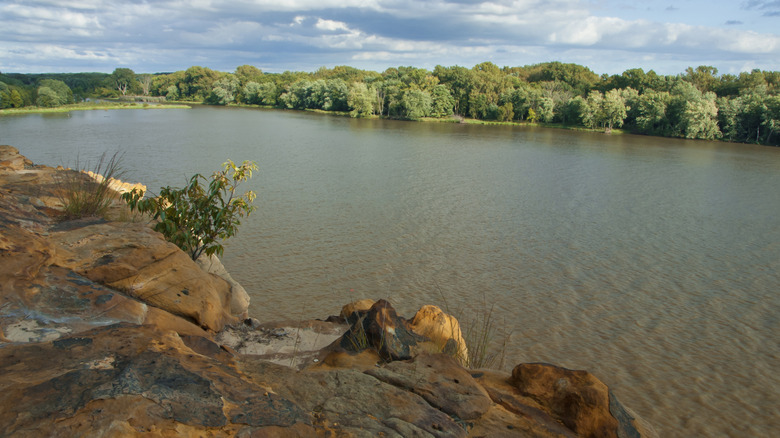 View of the Illinois River and riverside trees from the rocky bluffs at Buffalo Rock State Park, Illinois