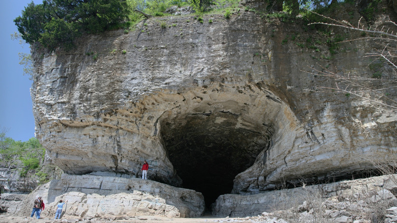 The exterior of Cave-in-Rock, a deep opening in a limestone cliff