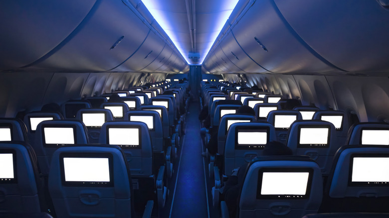 A dimmed plane cabin