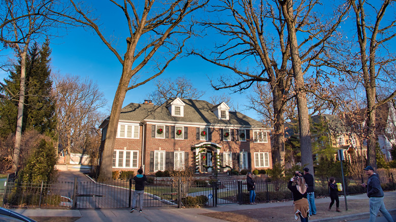 Fans taking photos in front of the 'Home Alone' house in Winnetka, Illinois