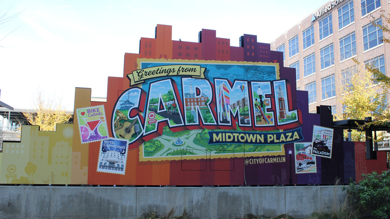 A mural greeting visitors to Carmel's Midtown Plaza.