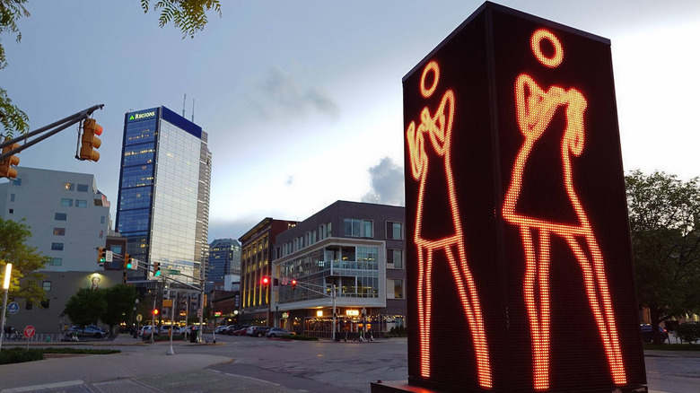 Ann Dancing electronic sculpture on the corner of Mass Ave