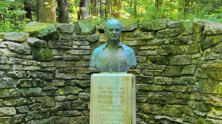 A bust of Colonel Lieber at a small memorial surrounded by stacked stone in Turkey Run State Park in Indiana