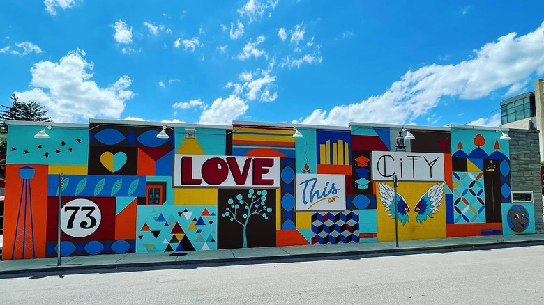 A large public mural on a building in Bloomington, Indiana