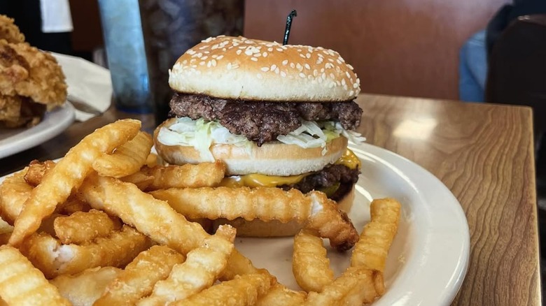 Twin steer burger and fries from the Steer-In