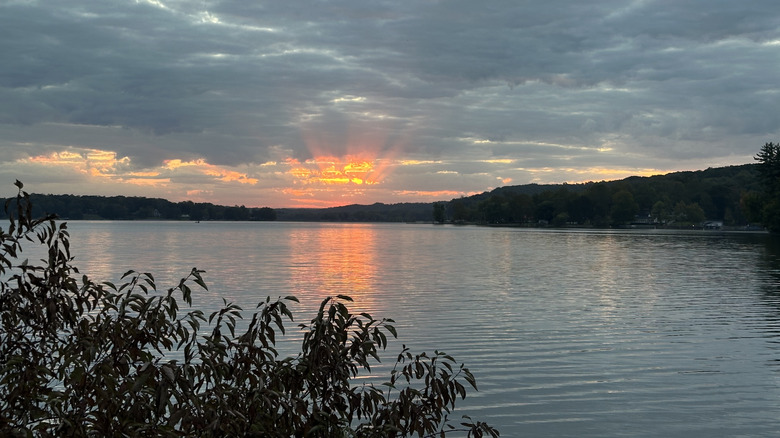 A late sunset reflects in the waters of Lake Lemon in Indiana