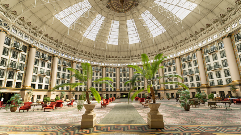 tables and chairs under the dome ceiling of the West Baden Springs Resort