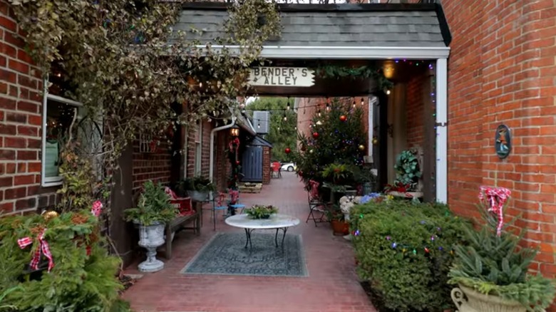 Picturesque alley amidst red-bricked buildings in downtown Zionsville, Indiana