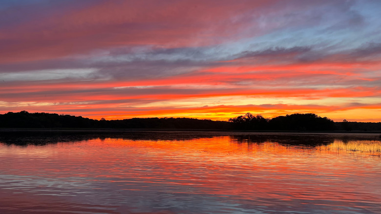 Sunset over Chain o' Lakes state park in Indiana