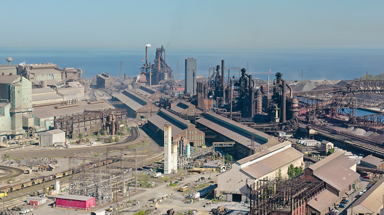 aerial view of industrial buildings near waterfront