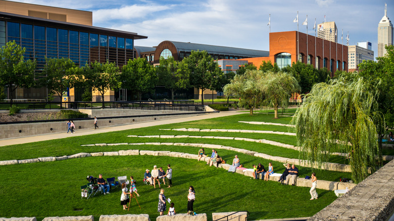 People at an outdoor ampitheather in White River State Park in Indianapolis, Indiana