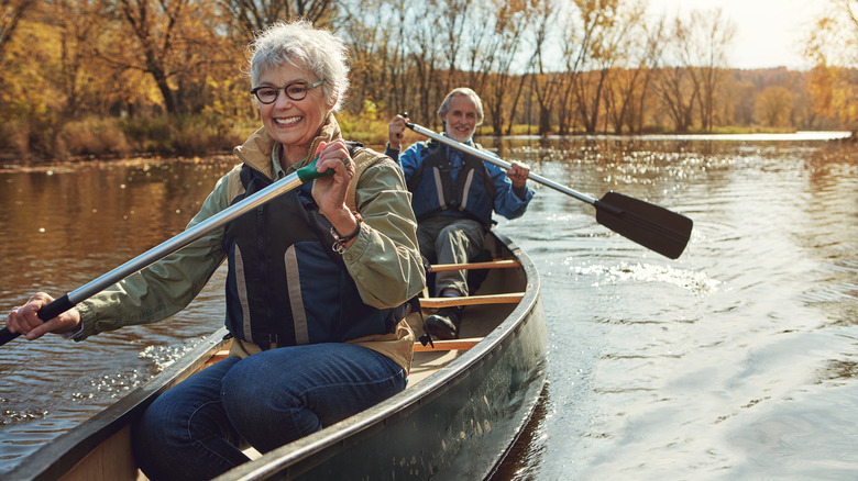 Couple paddling on a canoe