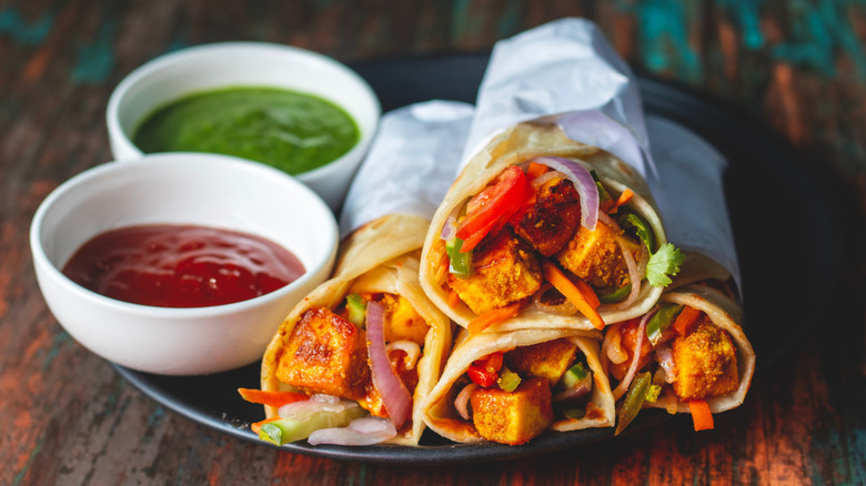 Kolkata's famous kathi rolls served with chutney and ketchup