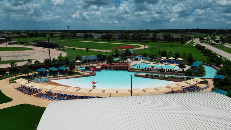 Aerial view of a park and pool in Iowa Colony.